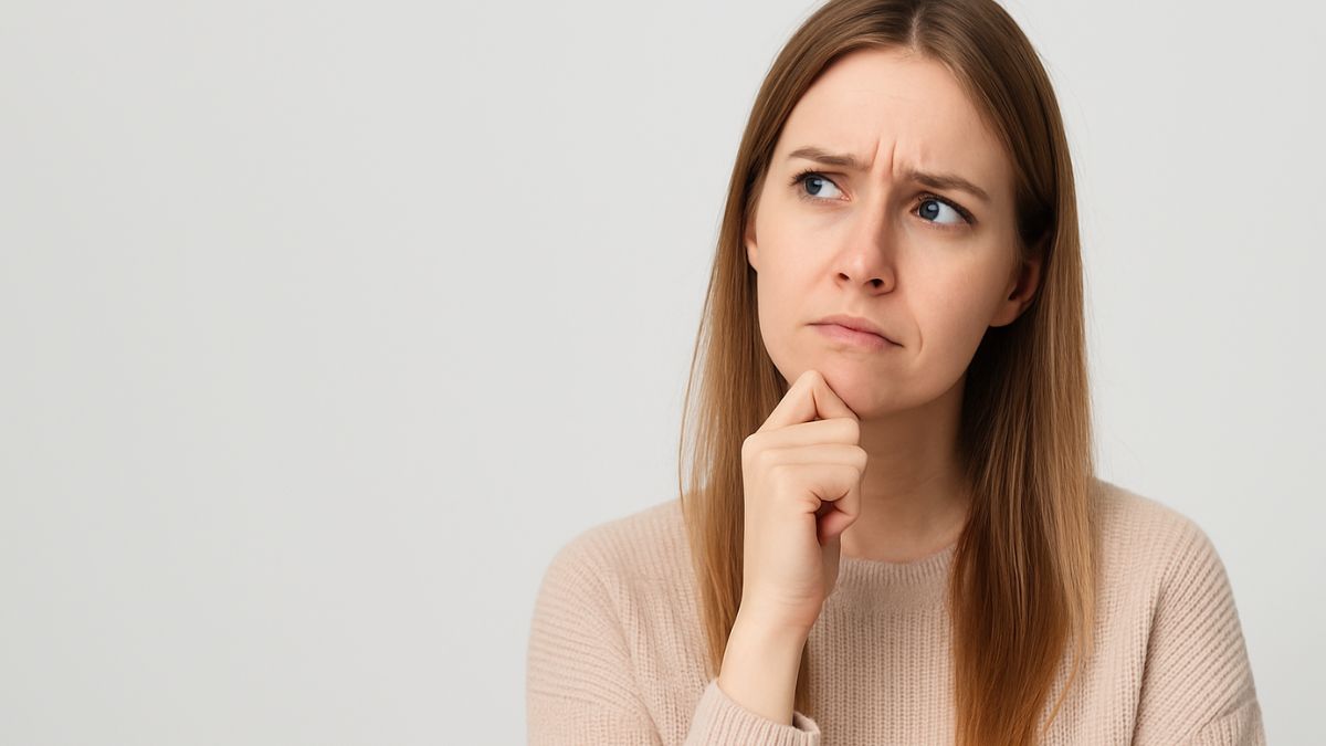 Thoughtful woman contemplating when to test for herpes